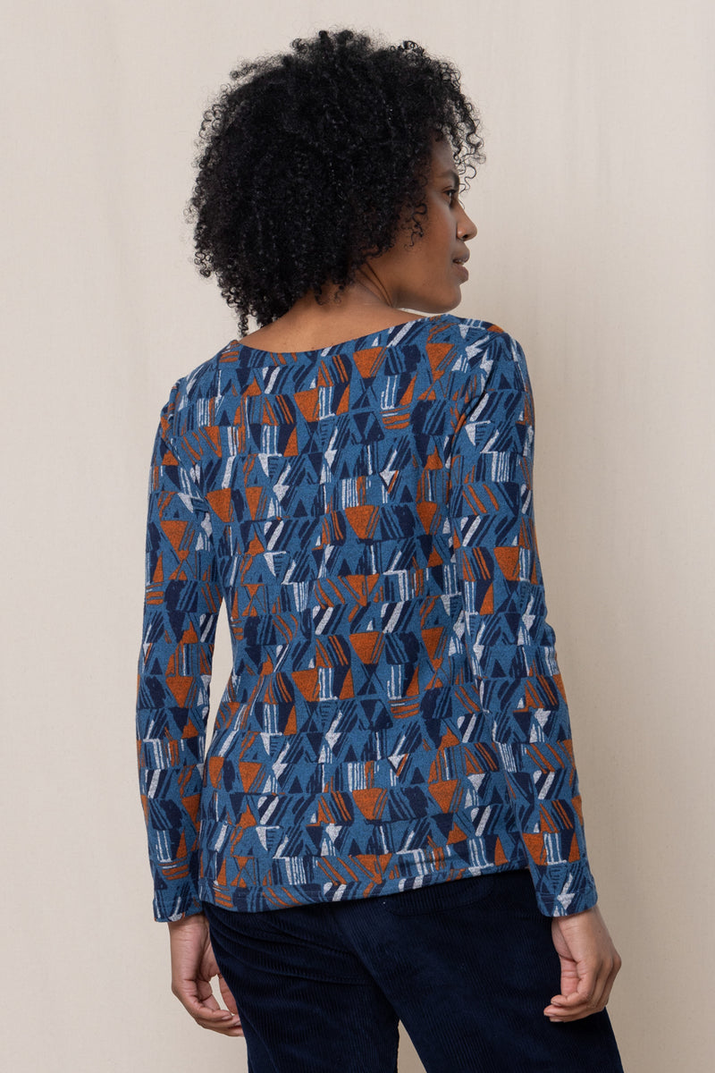 An image of the Angela Top Etching in Blue.