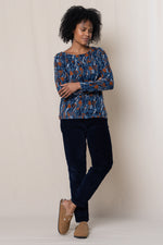 An image of the Angela Top Etching in Blue.