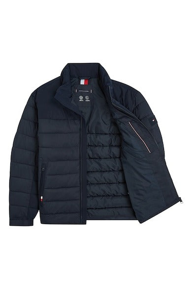 An image of the Tommy Hilfiger Mid New York Puffer Jacket in the colour Desert Sky.