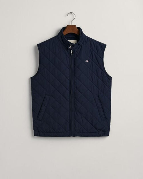 An image of the Gant Quilted Windcheater Vest in Evening Blue.